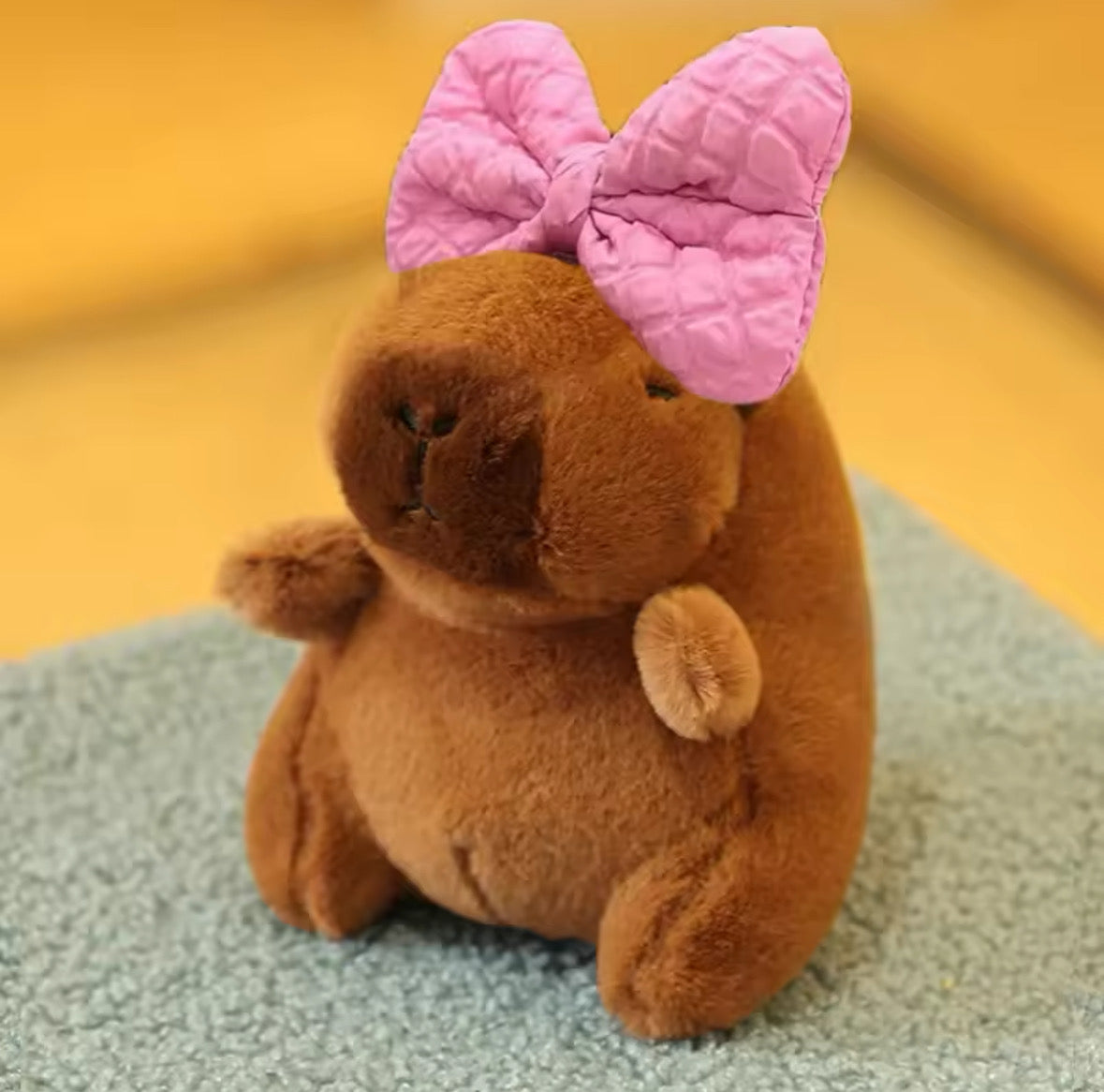 Our Cute Capybara with Pink Bow Keychain. Measures approx 13-14cm