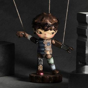 Figurine of a character on a dark background