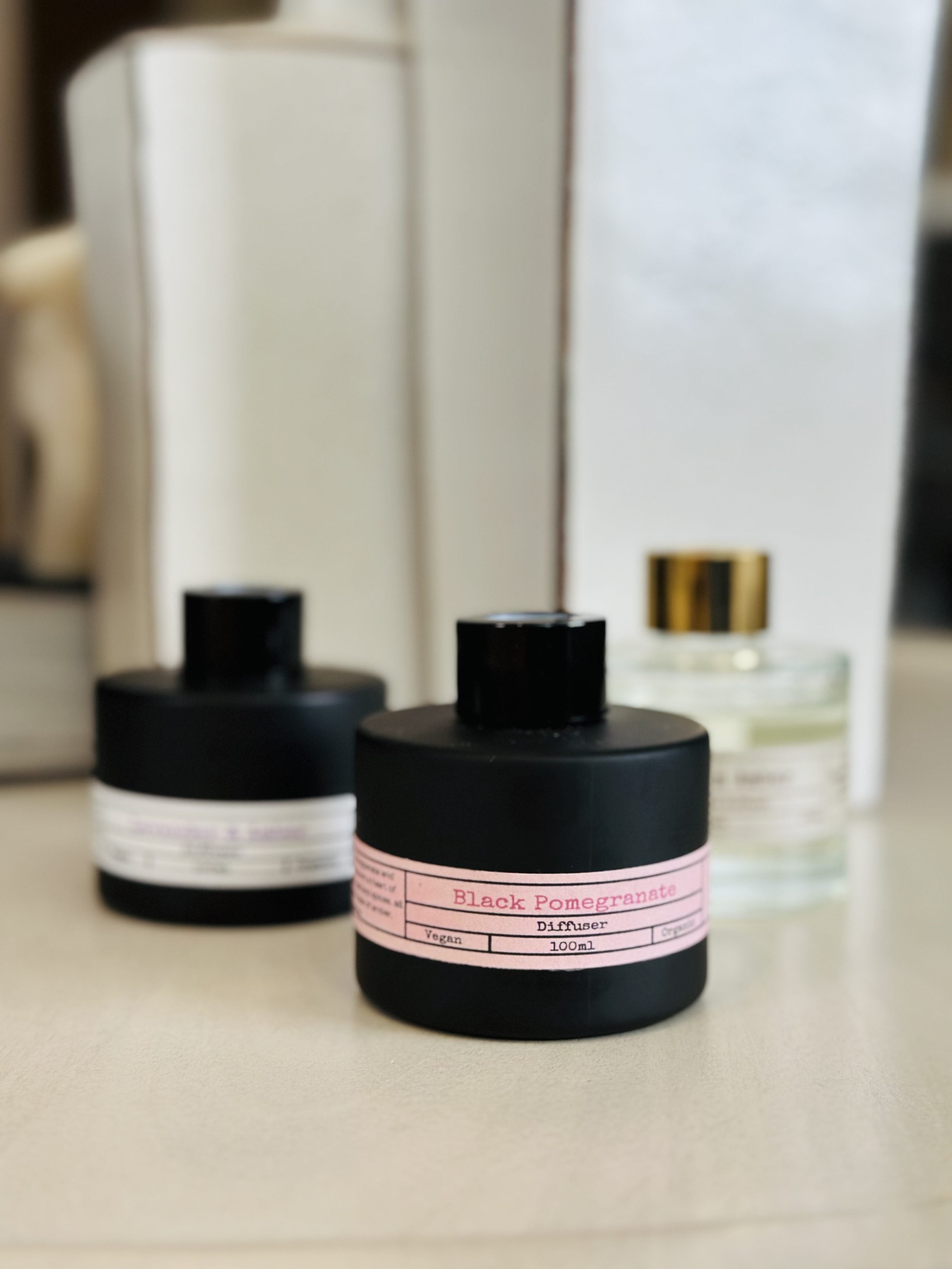 Introduce a touch of elegance to any room with our Matte Black Glass Reed Diffuser. The sleek cylinder design adds a modern feel, while the organic diffuser base and premium fragrance oils create a long-lasting, continuous scent of Black Pomegranate Enjoy the benefits of a luxurious and sophisticated atmosphere.