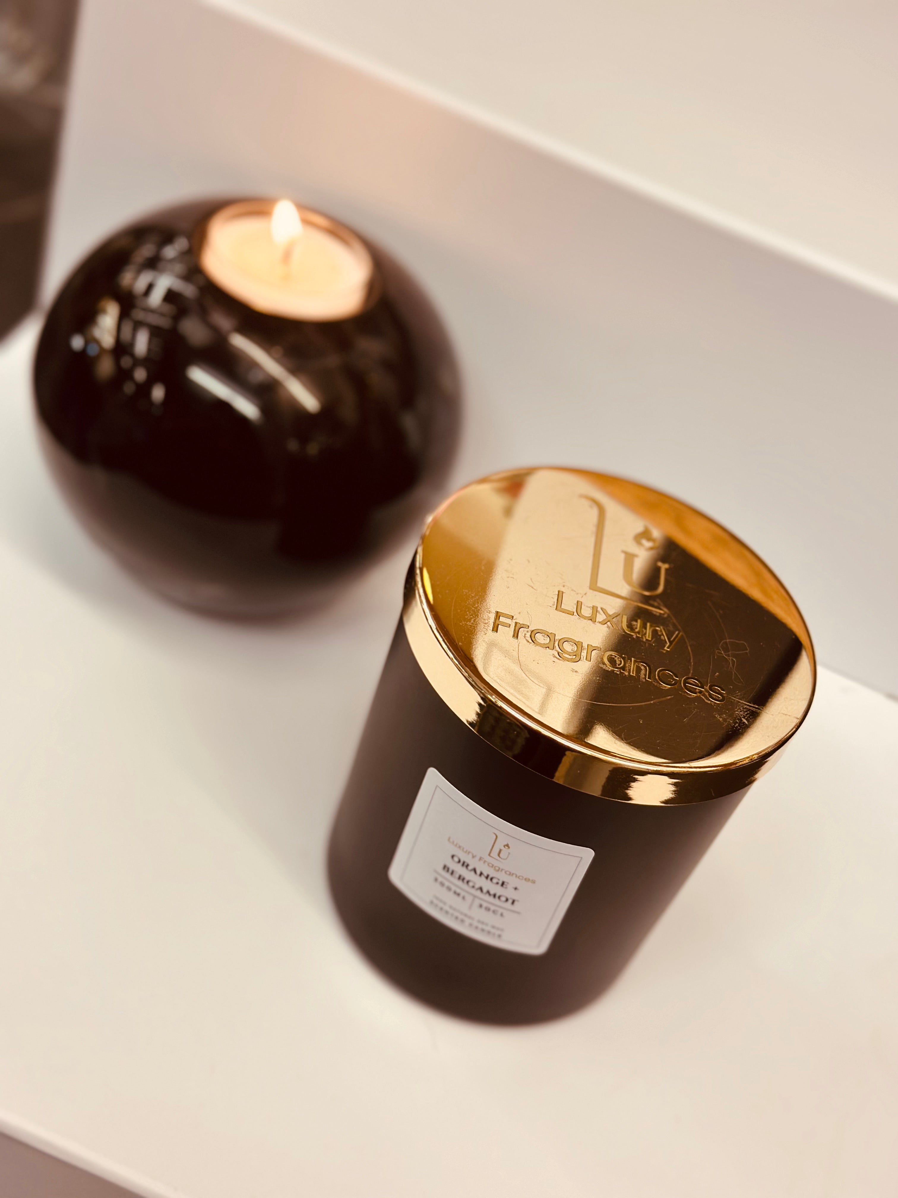 Our Matte Black (Orange & Bergamot) Scented Candle offers a refreshing combination of sweet and juicy orange, bergamot, and neroli scents. The clean and floral heart of orange blossom, lily, rose, and jasmine is complemented by a base of powdery musk and dry flowers. This combination creates a refreshing and rejuvenating ambiance for any space.