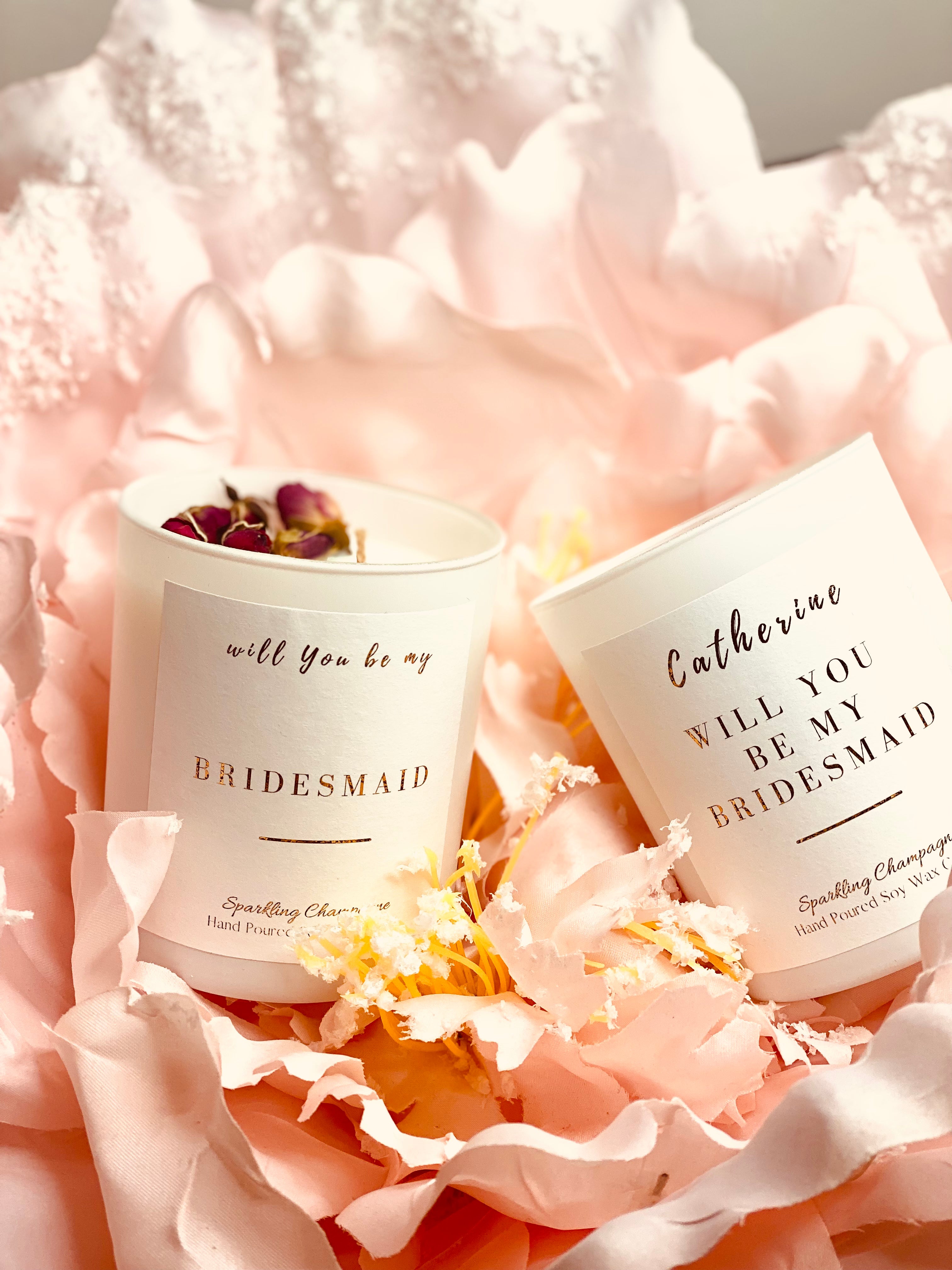 Indulge your bridesmaid in the ultimate luxury experience with our personalised candle. Give her the perfect surprise as you pop the question, and watch her delight as she realizes the thought and care you put into her gift. This elegant candle will make her feel special and appreciated on your big day.