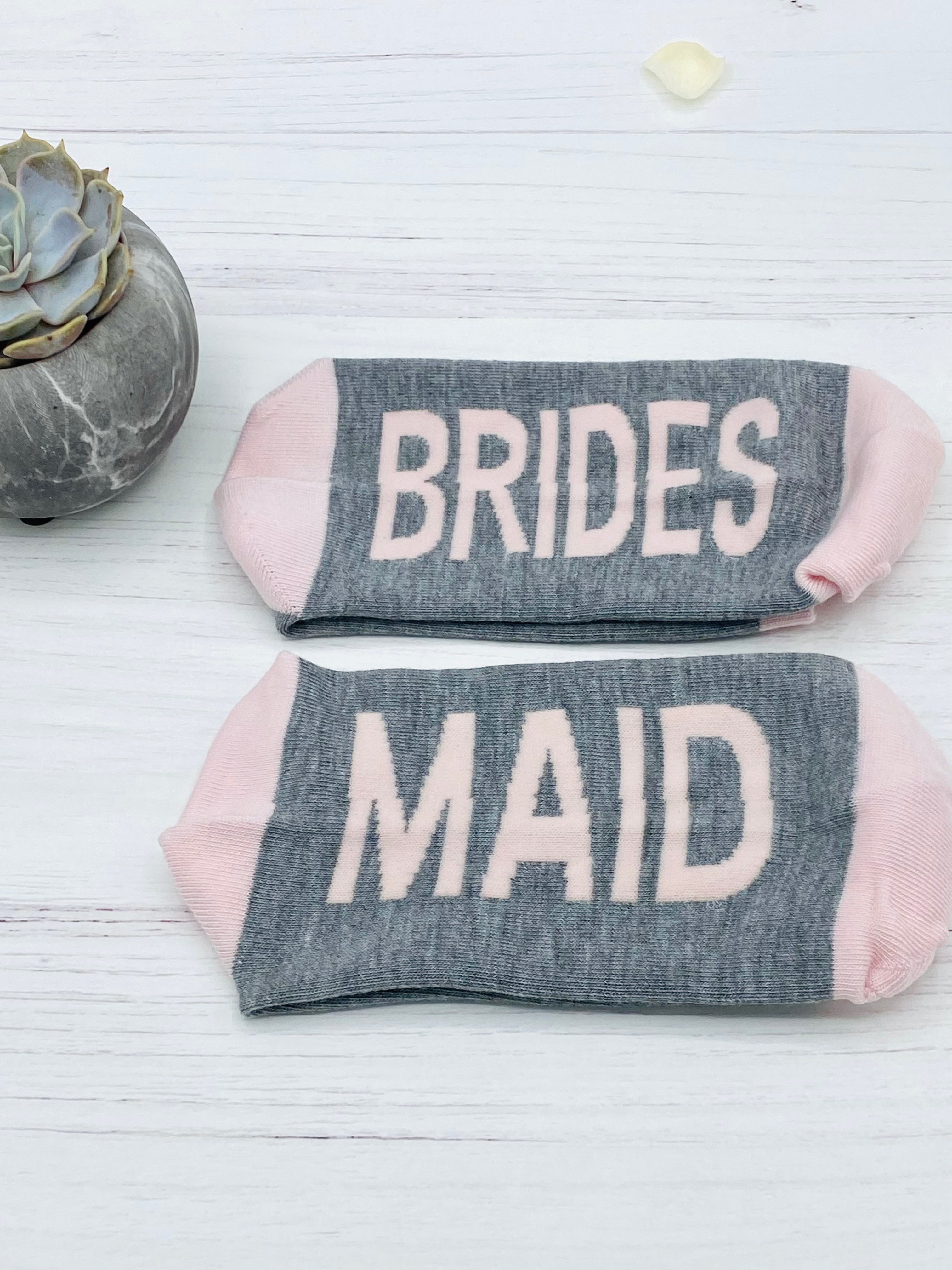 Our Hen Party Fun Socks are an added addition to any hen party. These bride squad cotton socks are a ladies one size (4-8) with a luxurious feel and extremely soft to the touch. Available in the colours shown only. So, why settle for plain socks when you can elevate your wedding party look with our Bridesmaid and Bride…