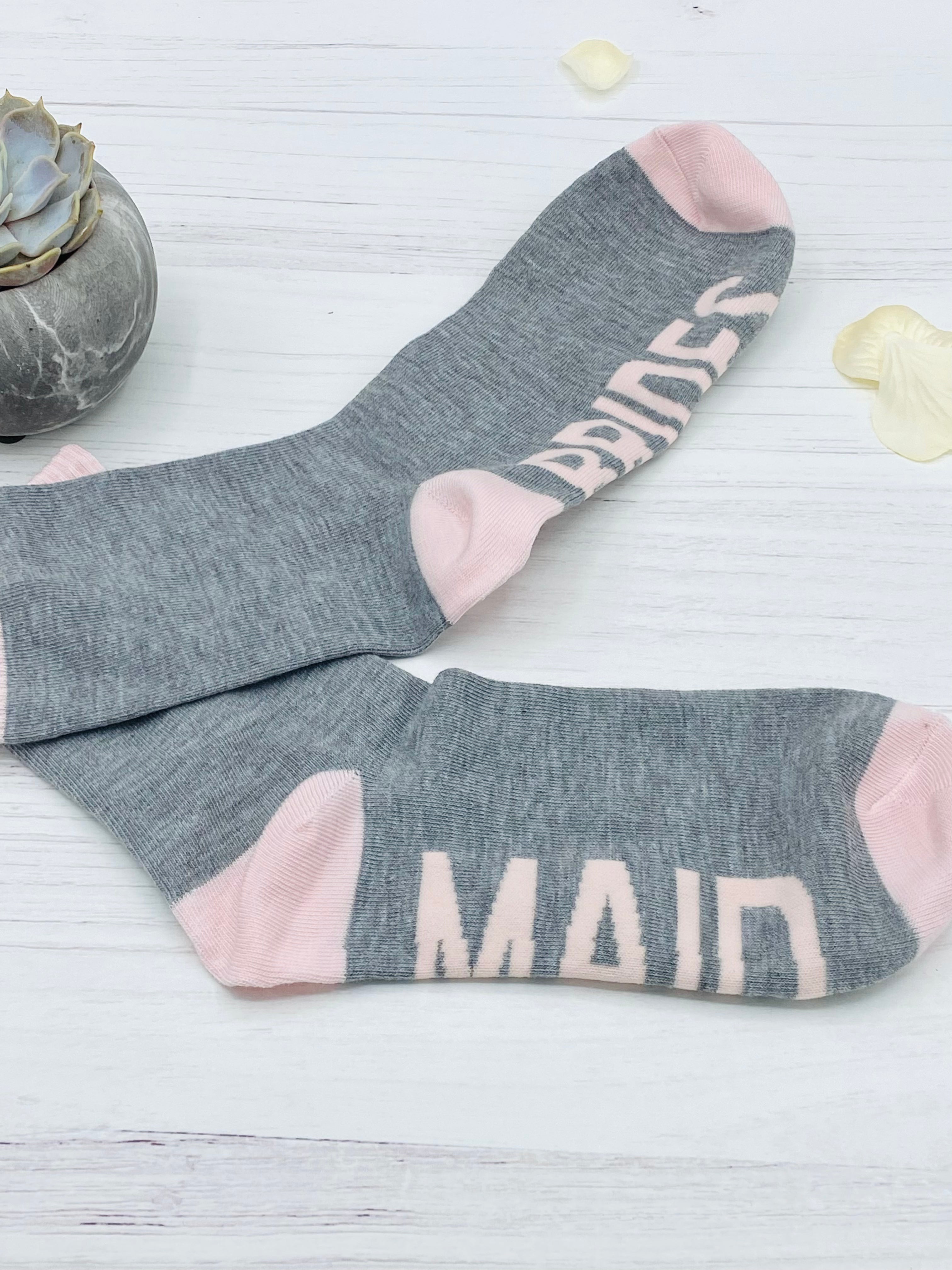 Our Hen Party Fun Socks are an added addition to any hen party. These bride squad cotton socks are a ladies one size (4-8) with a luxurious feel and extremely soft to the touch. Available in the colours shown only. So, why settle for plain socks when you can elevate your wedding party look with our Bridesmaid and Bride…