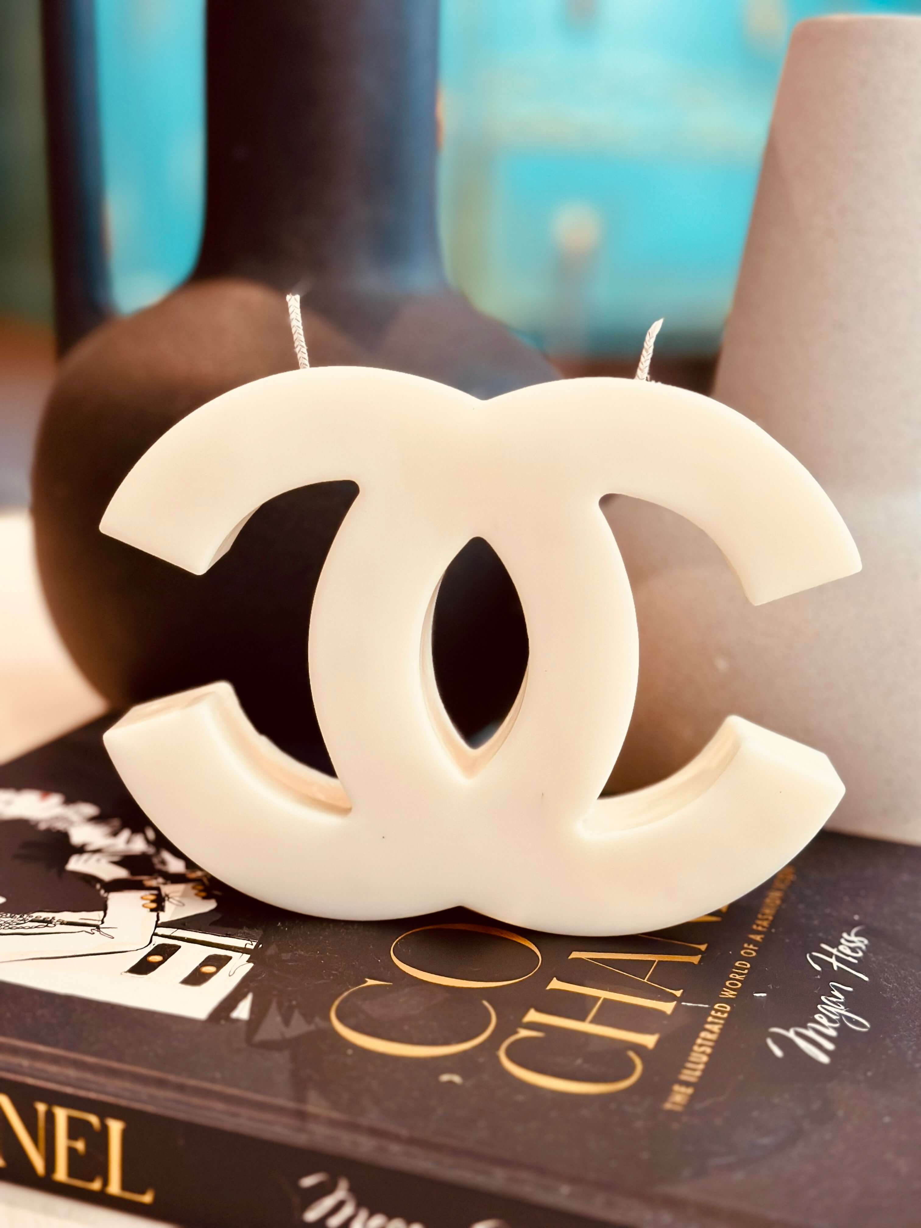 Experience the luxurious ambiance of our Inspired Designer Logo Candle. With its elegant logo design, this candle makes a stylish decor piece while filling your space with a rich and inviting fragrance. Made with premium materials, it's a perfect blend of style and relaxation.