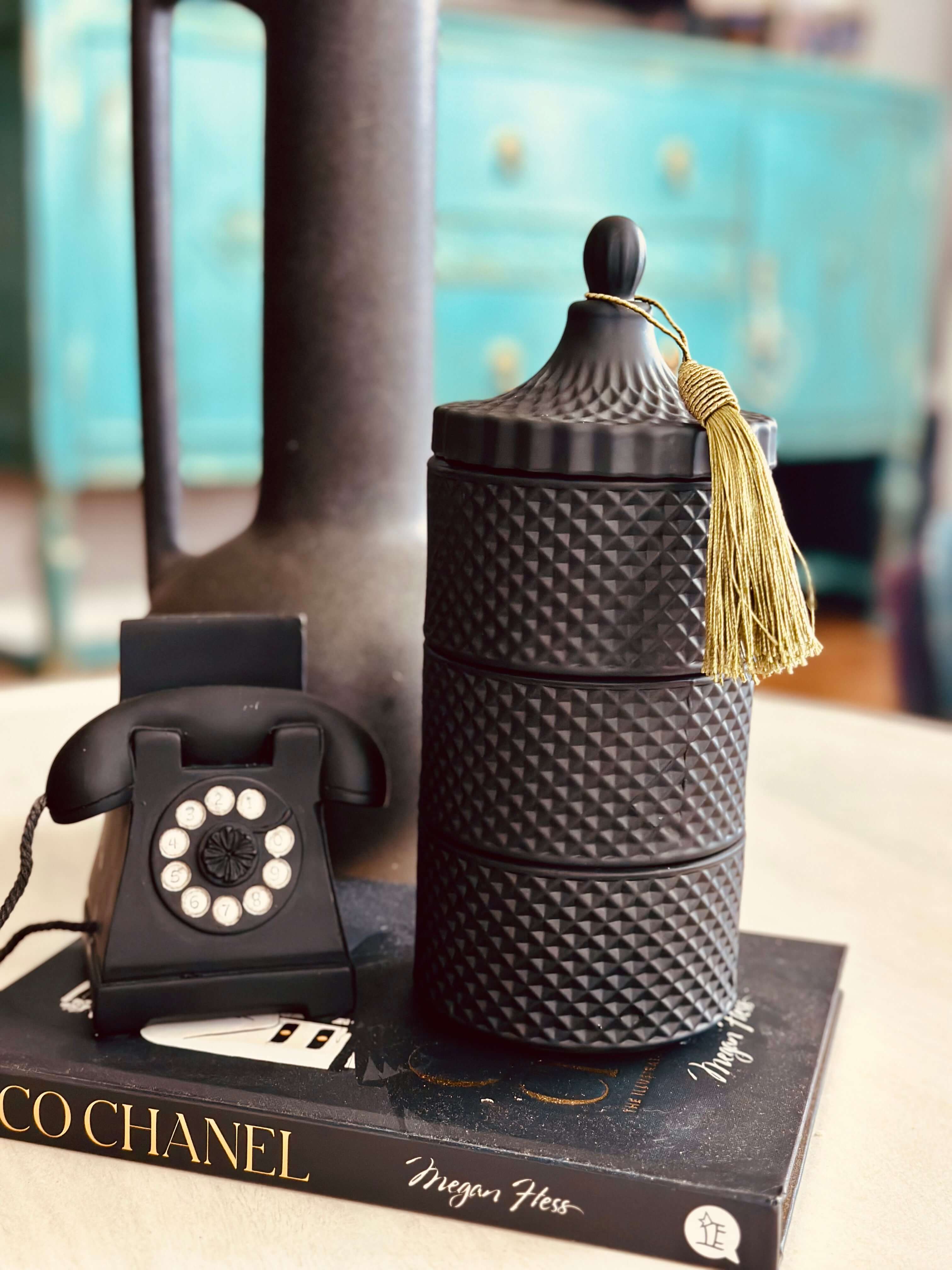 Experience the modern simplicity of our 3 Stackable Geo Candle Matte Black set. With its sleek geometric design, it adds a touch of elegance to any room. Each candle is hand-poured with 100% soy wax for a clean, long-lasting burn. Create a unique centrepiece or spread them throughout your home for a warm and inviting atmosphere.