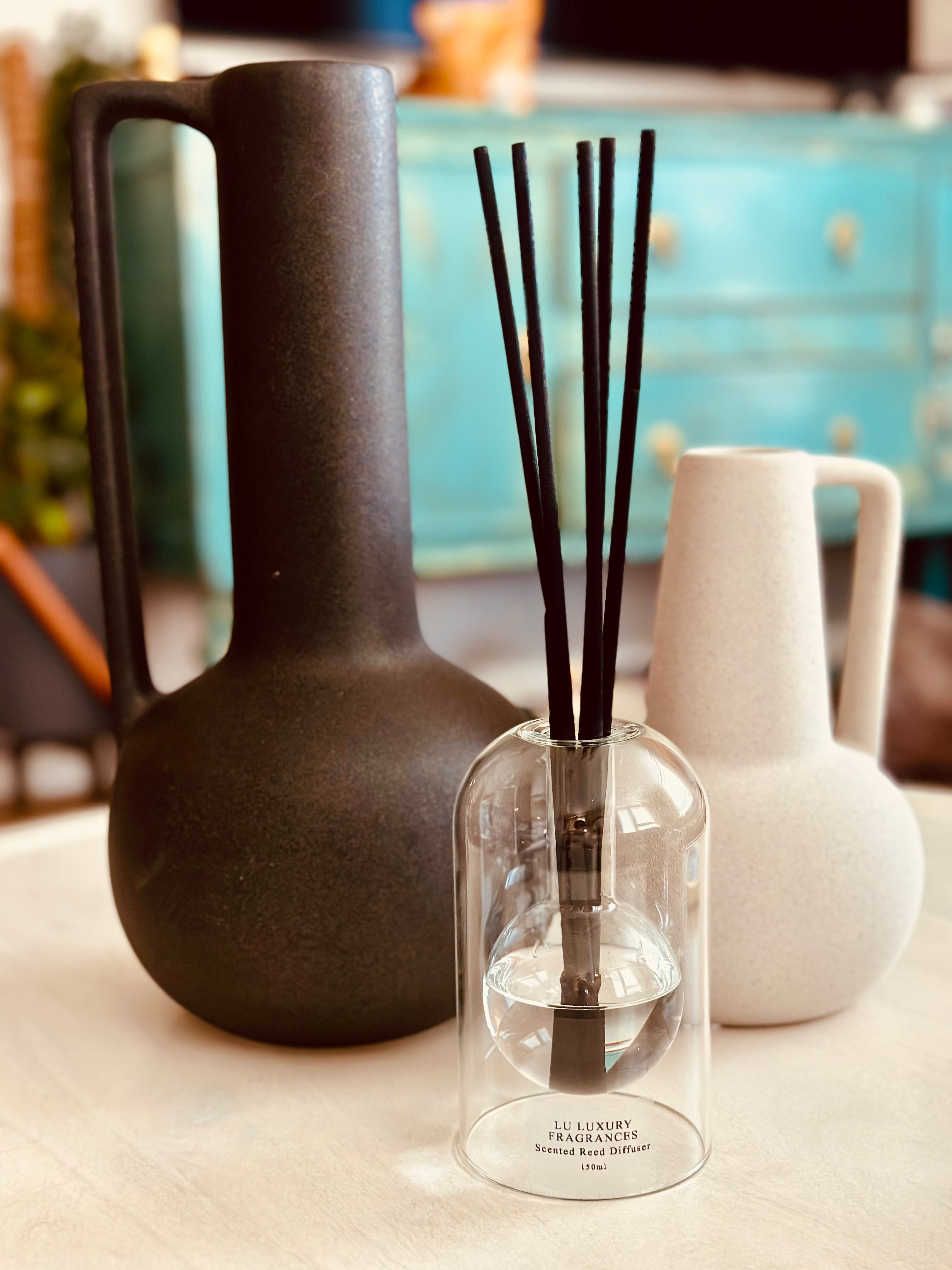 Designed with both elegance and innovation in mind, this Clear Glass Reed Diffuser boasts a sleek dome shape and built-in 120ml bottle for a seamless and sophisticated look.