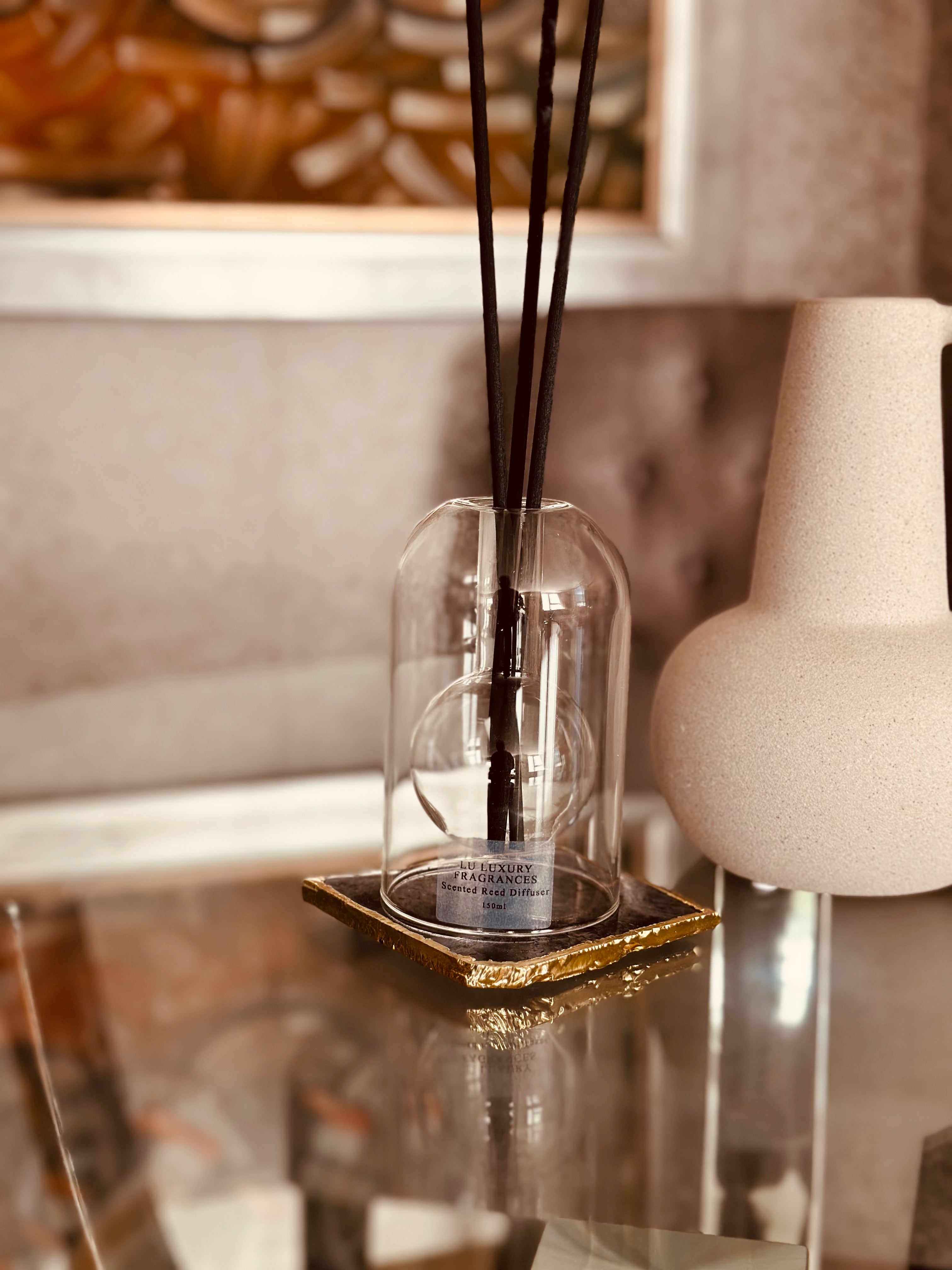 Designed with both elegance and innovation in mind, this Clear Glass Reed Diffuser boasts a sleek dome shape and built-in 120ml bottle for a seamless and sophisticated look.