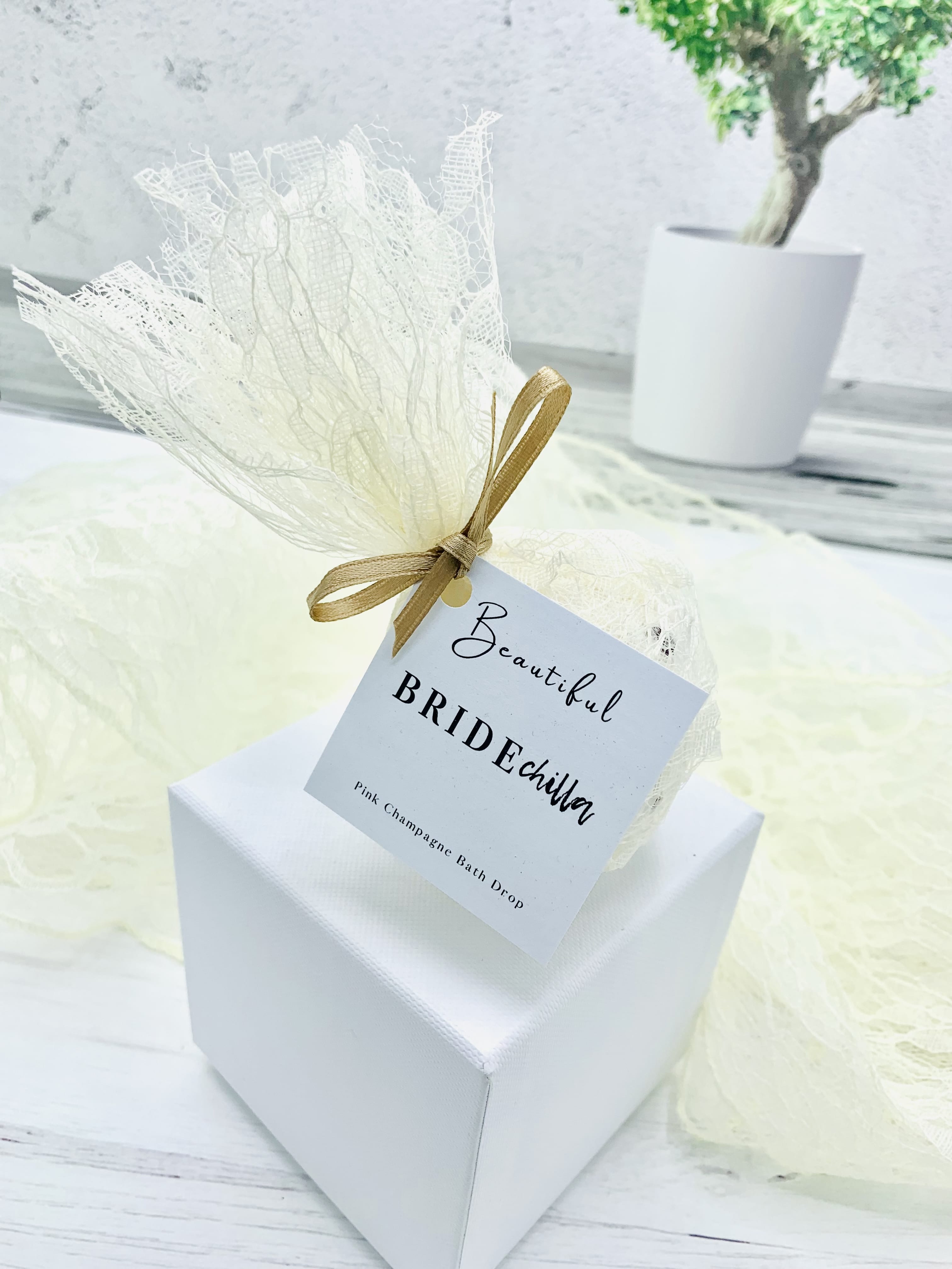 Indulge in a luxurious bath with the Bridechilla Bath Bomb. Made specifically for brides, this bath bomb will help you relax and unwind before the big day. With its unique blend of essential oils and soothing ingredients, it will leave your skin feeling soft and rejuvenated. Say goodbye to pre-wedding jitters and hello to pampered bliss.