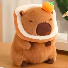 Meet the must-have plushie of 2025 - the Fluffy Capybara! With its endearing smile and soft fur.
Meet your new favourite plush toy - the Capybara Bread Head! This cute and quirky creation will brighten up your day with its lovable removable bread over his head and adorable capybara body. Perfect for snuggles or display, choose her with a Strawberry or Orange, this unique toy will bring a smile to your face. (No carbs, just cuteness!)
