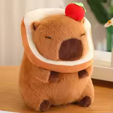 Meet the must-have plushie of 2025 - the Fluffy Capybara! With its endearing smile and soft fur.
Meet your new favourite plush toy - the Capybara Bread Head! This cute and quirky creation will brighten up your day with its lovable removable bread over his head and adorable capybara body. Perfect for snuggles or display, choose her with a Strawberry or Orange, this unique toy will bring a smile to your face. (No carbs, just cuteness!)