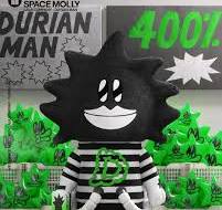 Character in a black and white striped outfit with green accents and text 'Durian Man' and '4001' on a dark background.