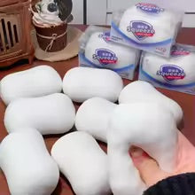 Multiple white ASMR crunchy soap ball squishy stress balls displayed together
