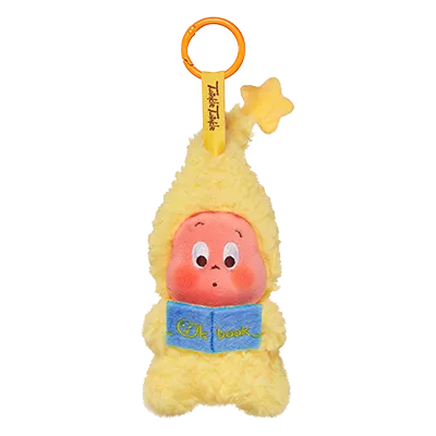 Yellow plush toy with a star-shaped rattle on a white background