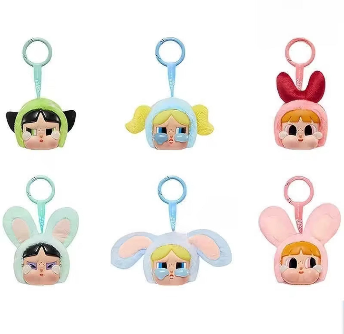 Introducing the Pop Mart Powerpuff Girls Cry Baby Series! Each blind box features a vinyl faced plush bag pendant doll.