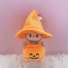 Plush pumpkin costume for Labubu Doll, on a white surface