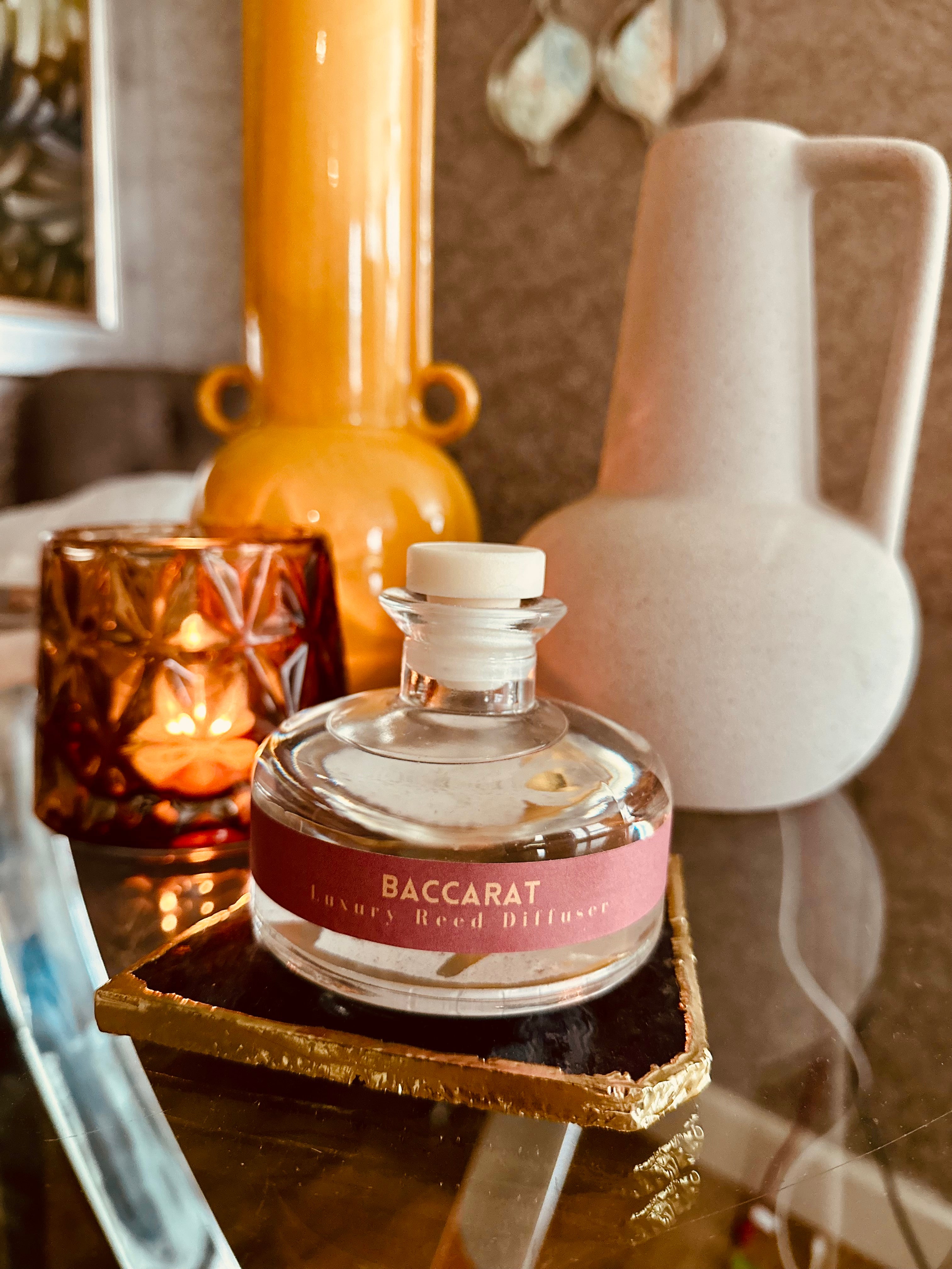 Elevate your home fragrance game with our Rouge Clear Glass Reed Diffuser.

Inspired by the luxurious Rouge (Baccarat Rouge Dupe) our 200ml diffuser adds a touch of sophistication to any space. Enjoy the long-lasting scent of this high-quality dupe in a sleek and modern clear glass design. Comes complete with 5 black fibre reeds.