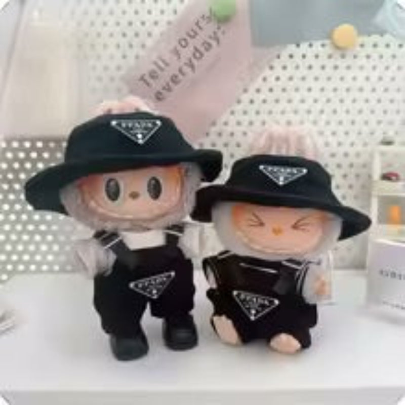 These charming labubu dolls wearing a black bucket hat and dungarees offering countless styling combinations. 