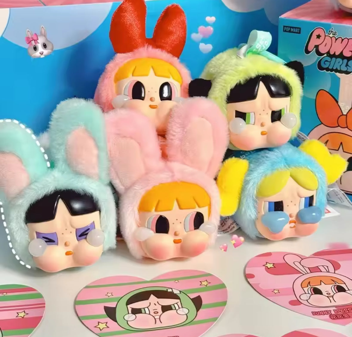 Introducing the Pop Mart Powerpuff Girls Cry Baby Series! Each blind box features a vinyl faced plush bag pendant doll.