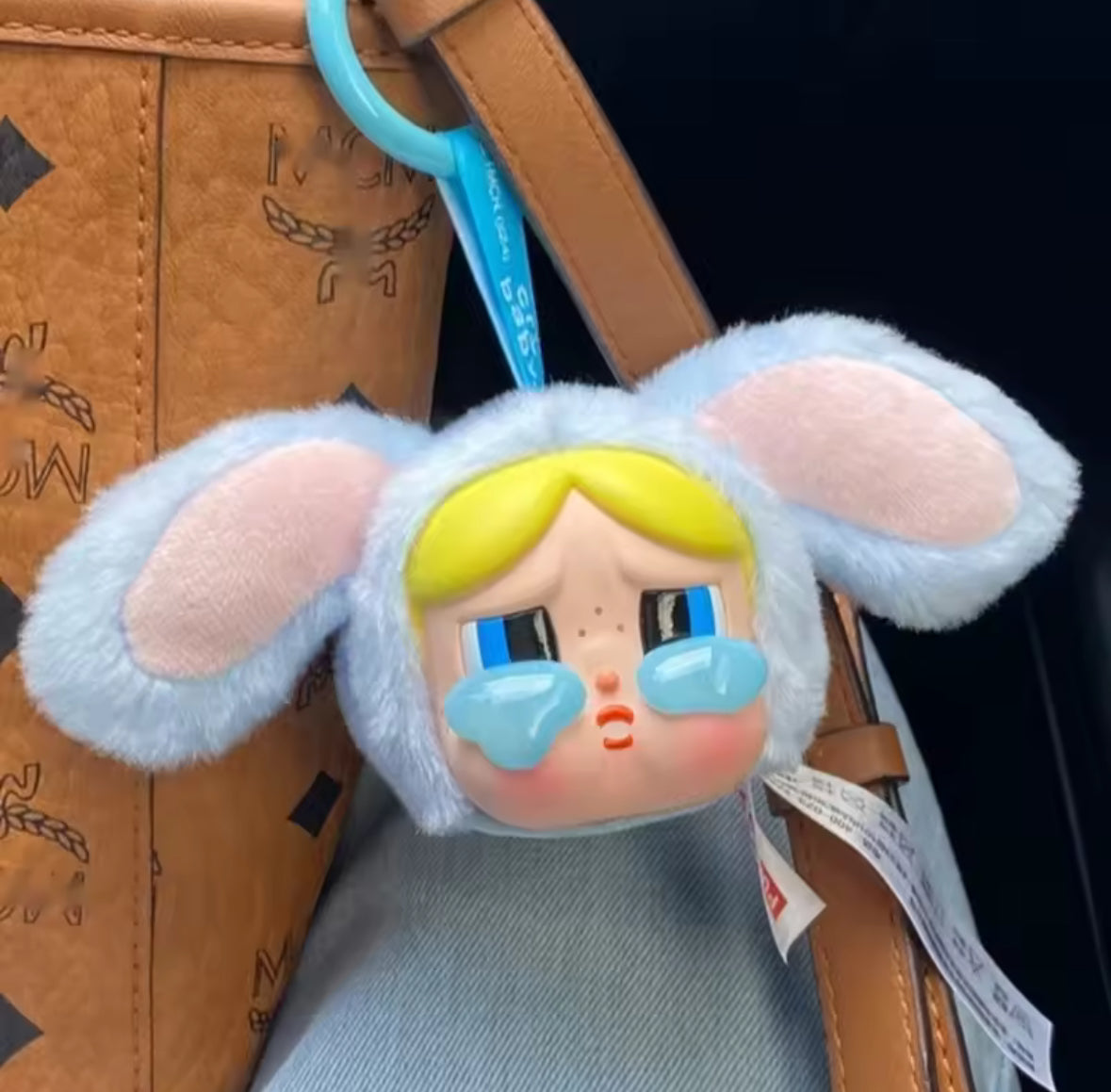 Introducing the Pop Mart Powerpuff Girls Cry Baby Series! Each blind box features a vinyl faced plush bag pendant doll.