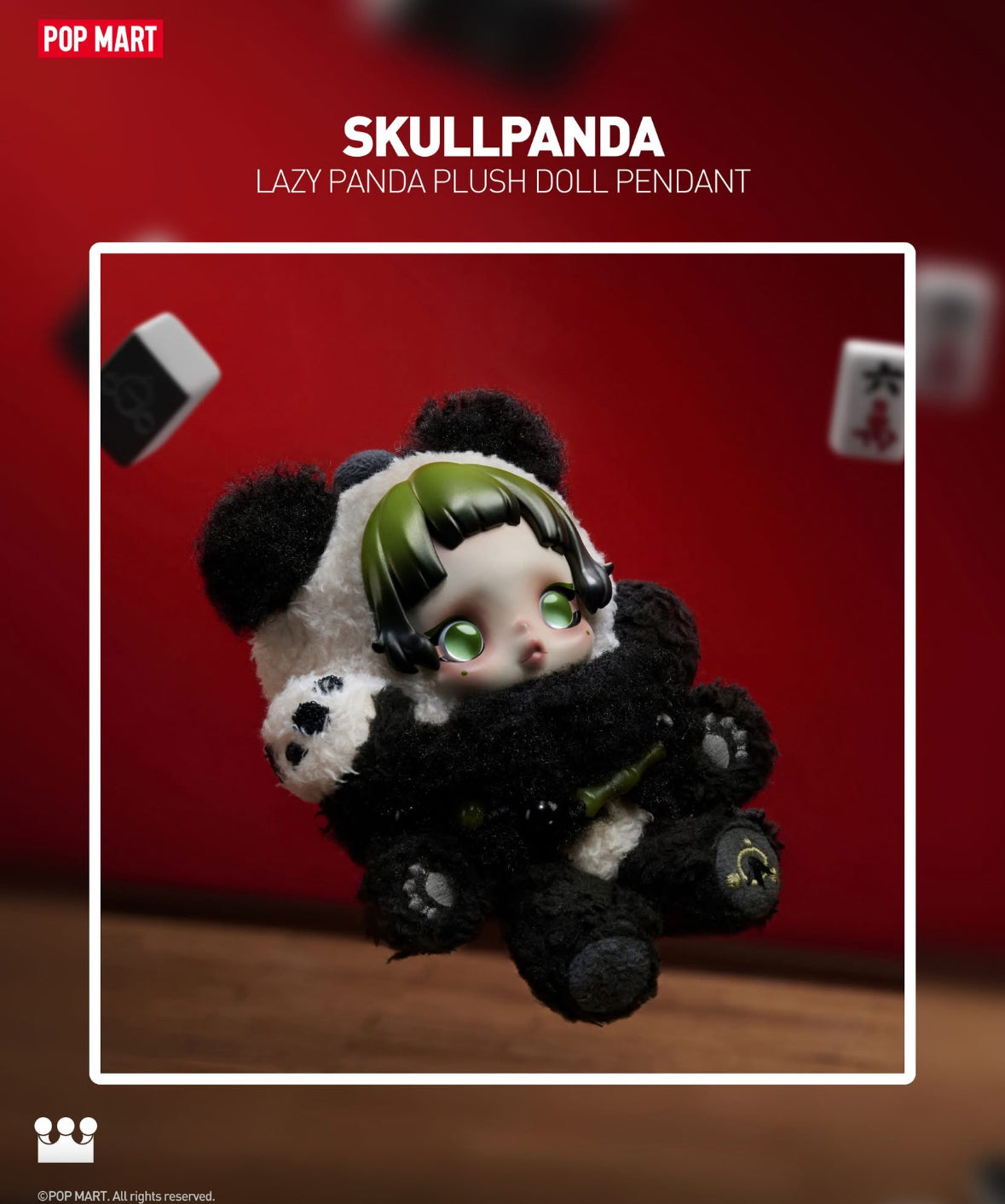 Skull Panda plush doll pendant with green hair against a red background, featuring the Pop Mart brand.