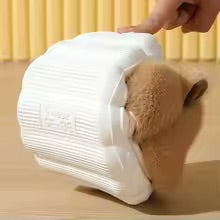 White textured slipper sole on a wooden surface