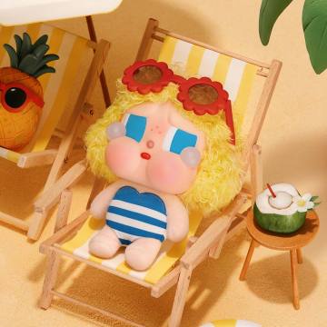 Toy character with sunglasses and a swimsuit sitting on a beach chair with a pineapple and coconut drink in the background.