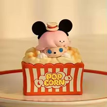 Animated character in a popcorn box with a white background
