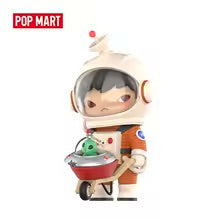 Toy figure of a child in an astronaut suit holding a green alien, with Pop Mart logo above.