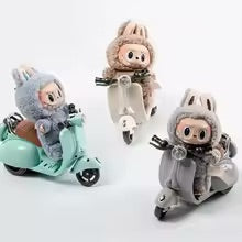 The Labubu The Monsters Scooter/Moped is bursting with cool colors and personality. Battery-powered with fully working lights, sounds, and exciting moving stunts, it brings endless fun and adventure to your Labubu’s playtime.