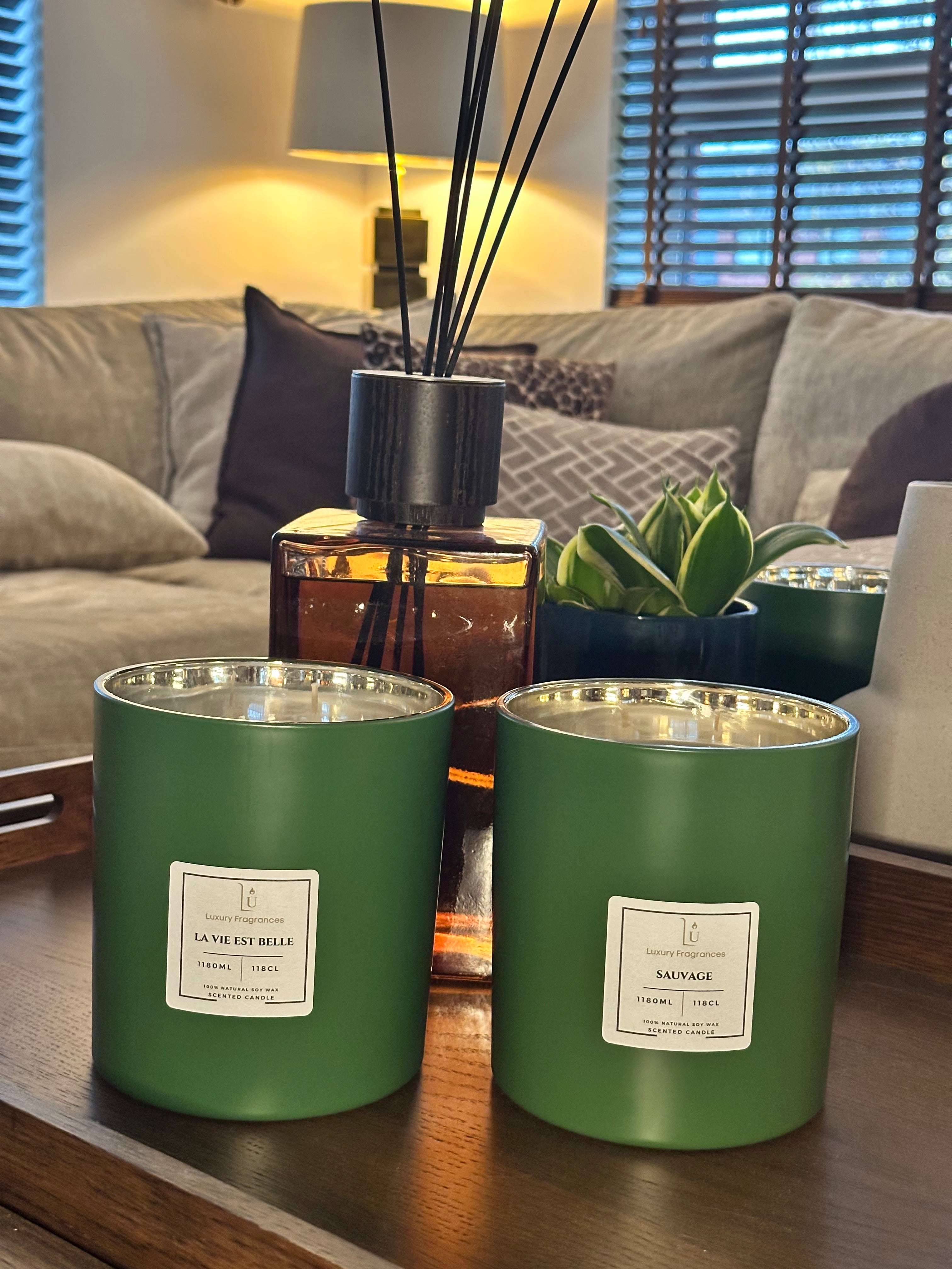 Two large tumblers on a brown table in a home setting.