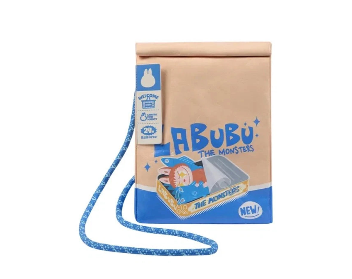Pop Mart messenger bag with a blue strap labeled 'Labubu The Monsters' on a white background